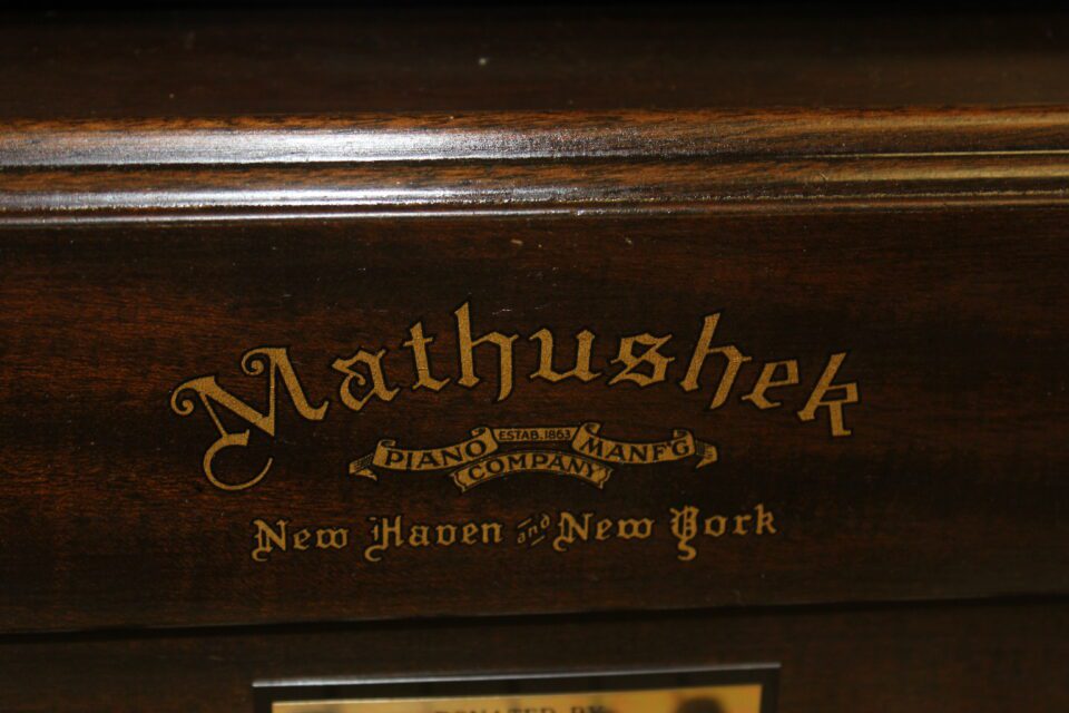 Mathushek spinet grand piano nameplate