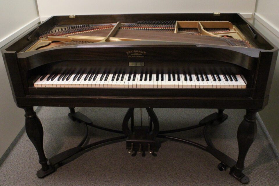 Mathushek spinet grand piano with the lid removed
